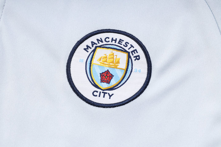 NEW MANCHESTER CITY 1º TRACKSUIT POLO 23/24