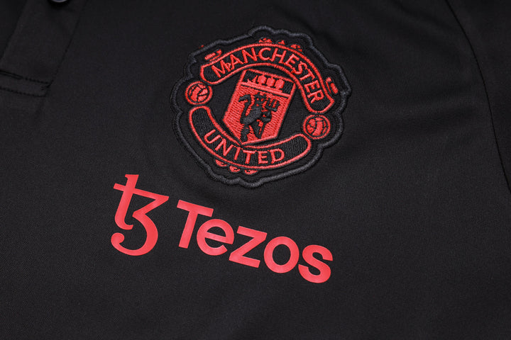 NEW MANCHESTER UNITED 1º TRACKSUIT POLO 23/24